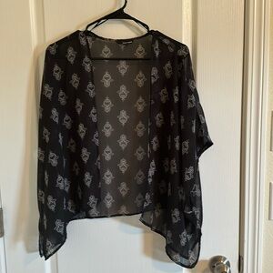 Functional Tunic. You can wear it on top of everything. Like crop top or bikini